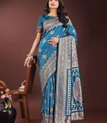 Teal silk blend woven zari work tassel saree