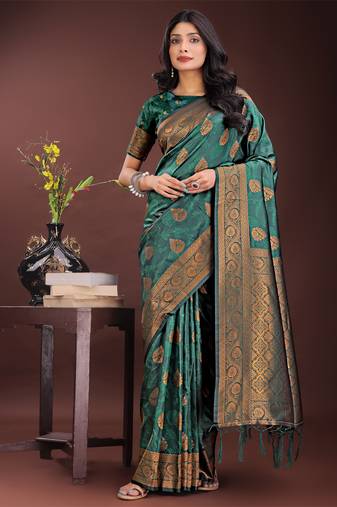 Dark green silk blend woven zari work tassel saree
