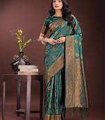 Dark green silk blend woven zari work tassel saree