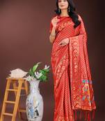 Red silk blend woven zari work tassel saree