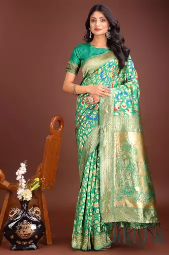 Green lichi silk blend woven zari work tassel saree