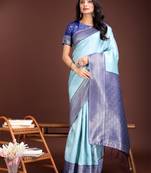 Teal lichi silk blend woven zari work tassel saree