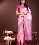 Light pink lichi silk blend woven zari work tassel saree