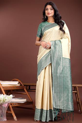 Cream lichi silk blend woven zari work tassel saree