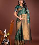 Green banarasi silk blend woven zari work tassel saree