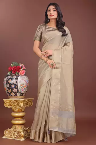 Beige organza woven zari work tassel saree
