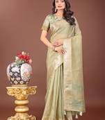 Light green organza woven zari work tassel saree
