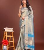 Grey organza woven zari work tassel saree