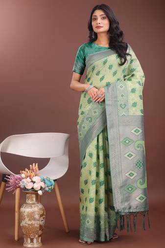 Light green linen cotton woven zari work tassel saree