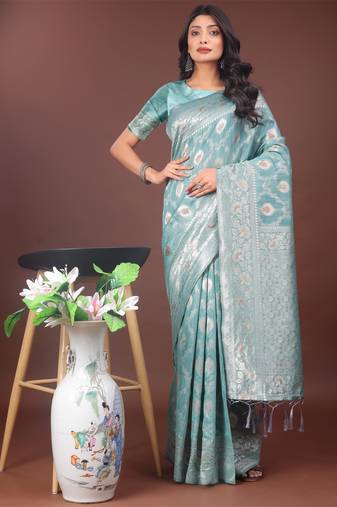 Sea green linen cotton woven zari work tassel saree