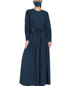Teal abaya with multiple pleats and belt. comes with a matching hijab.