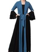 Blue stylish dress with attached shrug and a belt in multi color