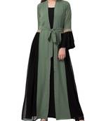 Green stylish dress with attached shrug and a belt in multi color