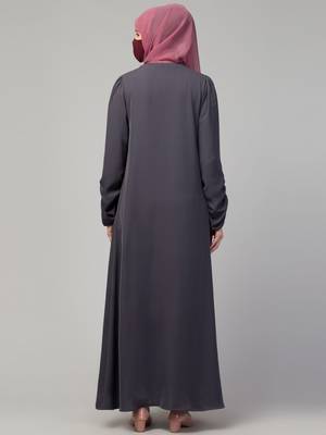 Simple yet stylish abaya in premium  stretchable praada fabric with fabric buttons 2
