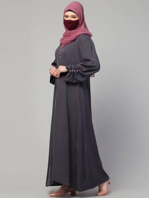 Simple yet stylish abaya in premium  stretchable praada fabric with fabric buttons 5