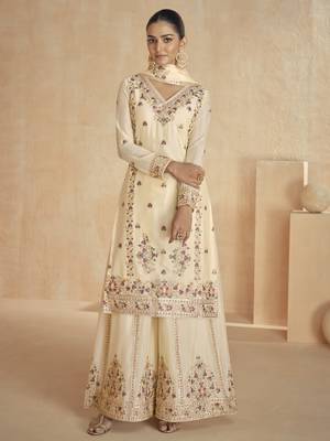 Cream floral embroidered chinnon silk sharara suit with dupatta 1