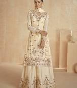 Cream floral embroidered chinnon silk sharara suit with dupatta