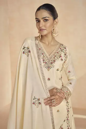 Cream floral embroidered chinnon silk sharara suit with dupatta