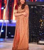 Beige Net Saree with Red Velvet Blouse