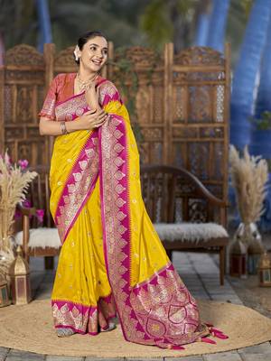 banarasi woven yellow and pink saree with heavy jacquard work 1