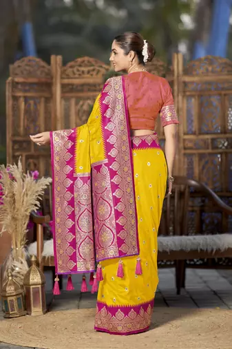 banarasi woven yellow and pink saree with heavy jacquard work