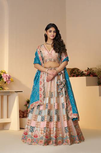 Powder blue Position print Jaal Patterned party wear lehengas with Sequin & Aari Work