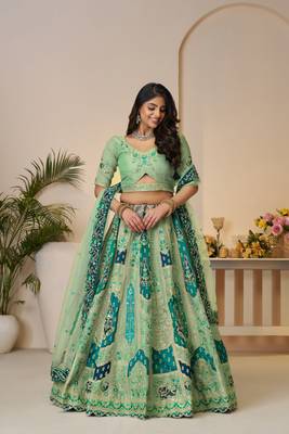 The Rajsi Haathi Collection: Graceful Green with  peacock Embroidered bridal lehenga 1