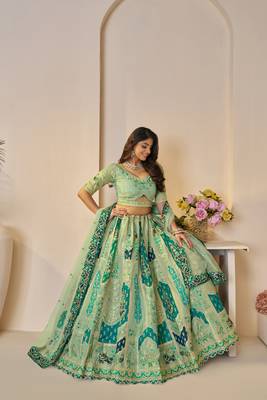 The Rajsi Haathi Collection: Graceful Green with  peacock Embroidered bridal lehenga 2