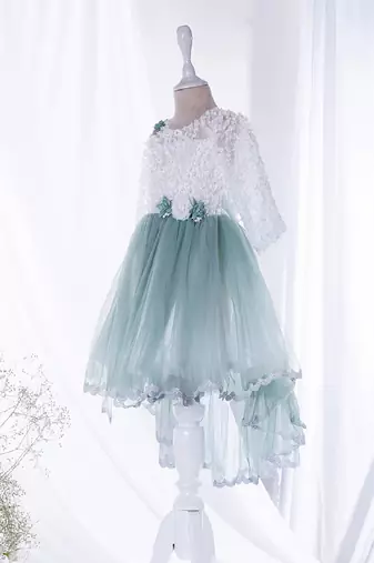 Mini stitch green solid net corsage applique bottom lace detailed frock