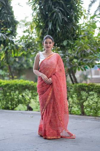 orange dabu kota doria saree