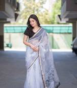 white kota doria saree