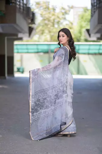 white kota doria saree