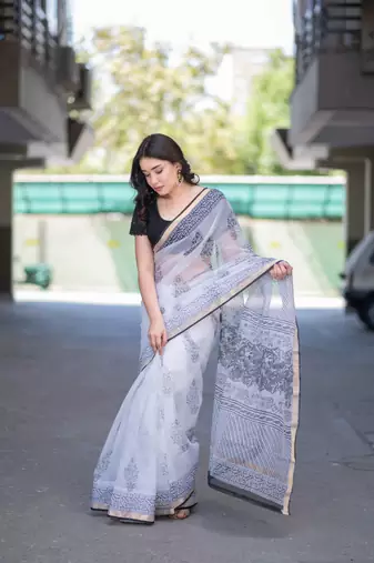 white kota doria saree