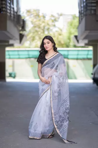 white kota doria saree
