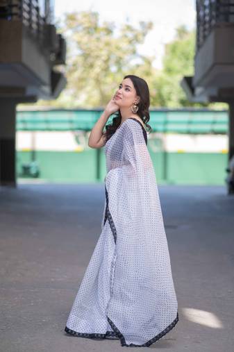 white saree with black dots