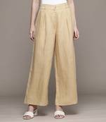 Beige essential-bottoms pants by ritu kumar