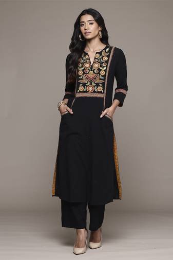 Black carpet kurta set by ritu kumar