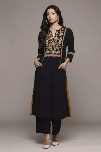 Black carpet kurta set by ritu kumar