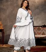 Designer traditional cambric cotton fabric white color heavy embroidery kurta set with dupatta