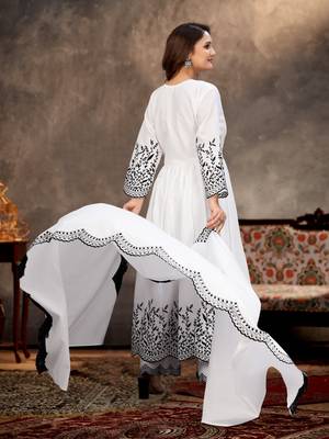 Designer traditional cambric cotton fabric white color heavy embroidery kurta set with dupatta 2