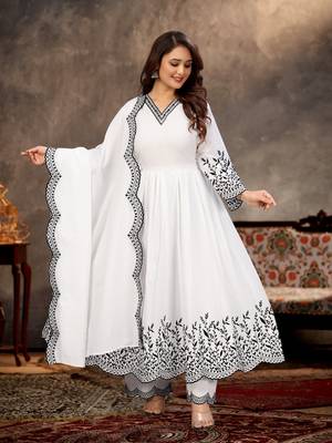 Designer traditional cambric cotton fabric white color heavy embroidery kurta set with dupatta 3
