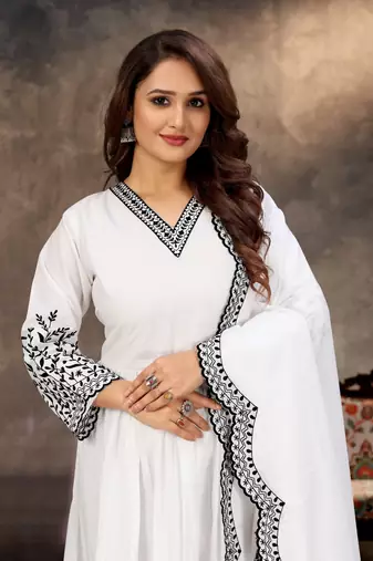 Designer traditional cambric cotton fabric white color heavy embroidery kurta set with dupatta