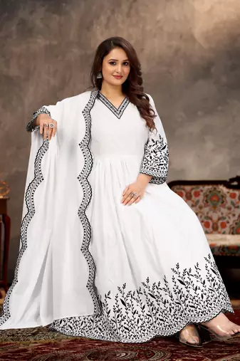 Designer traditional cambric cotton fabric white color heavy embroidery kurta set with dupatta