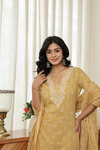 yellow floral thread work straight kurta trouser dupatta set