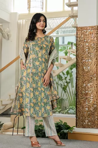 green floral a-line kurta trouser dupatta set with lace work