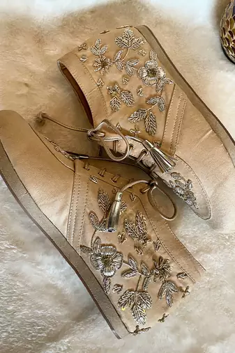 Gold embroidered sneakers