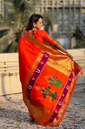 Bright orange zari woven vitthala god paithani silk blend saree