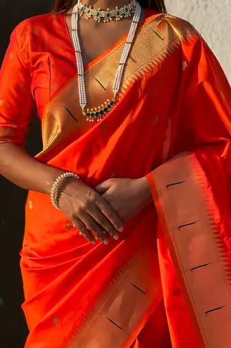 Bright orange zari woven vitthala god paithani silk blend saree