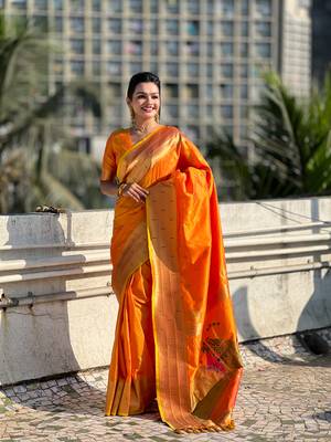 Orange zari woven gudi padwa special paithani silk blend saree 1
