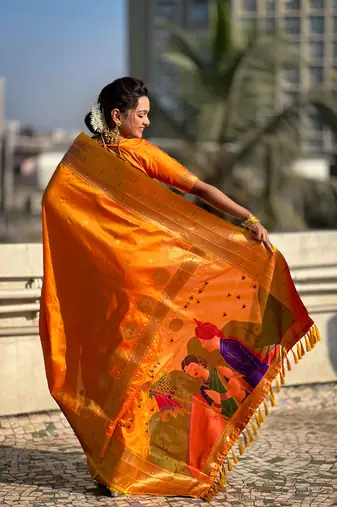 Orange zari woven gudi padwa special paithani silk blend saree